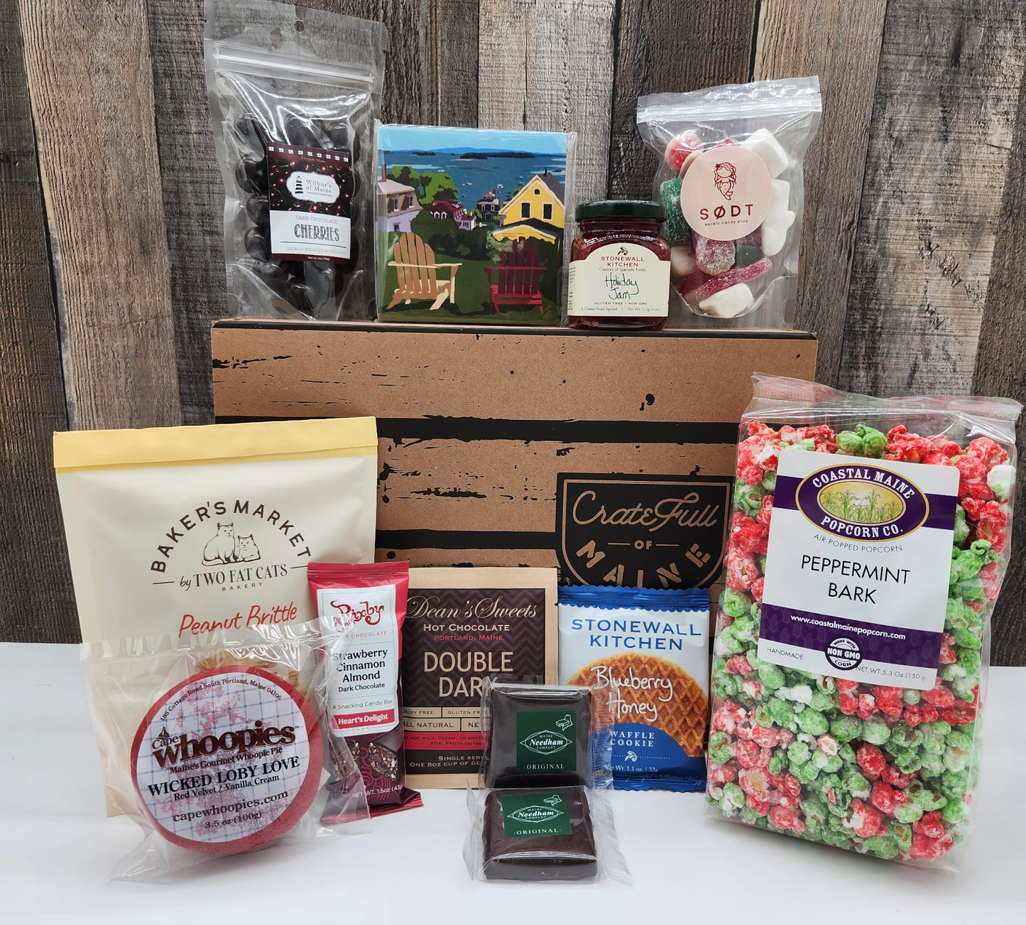 Assorted snacks and treats on a wooden surface